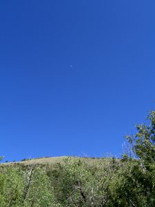 Moon on clear Colorado day